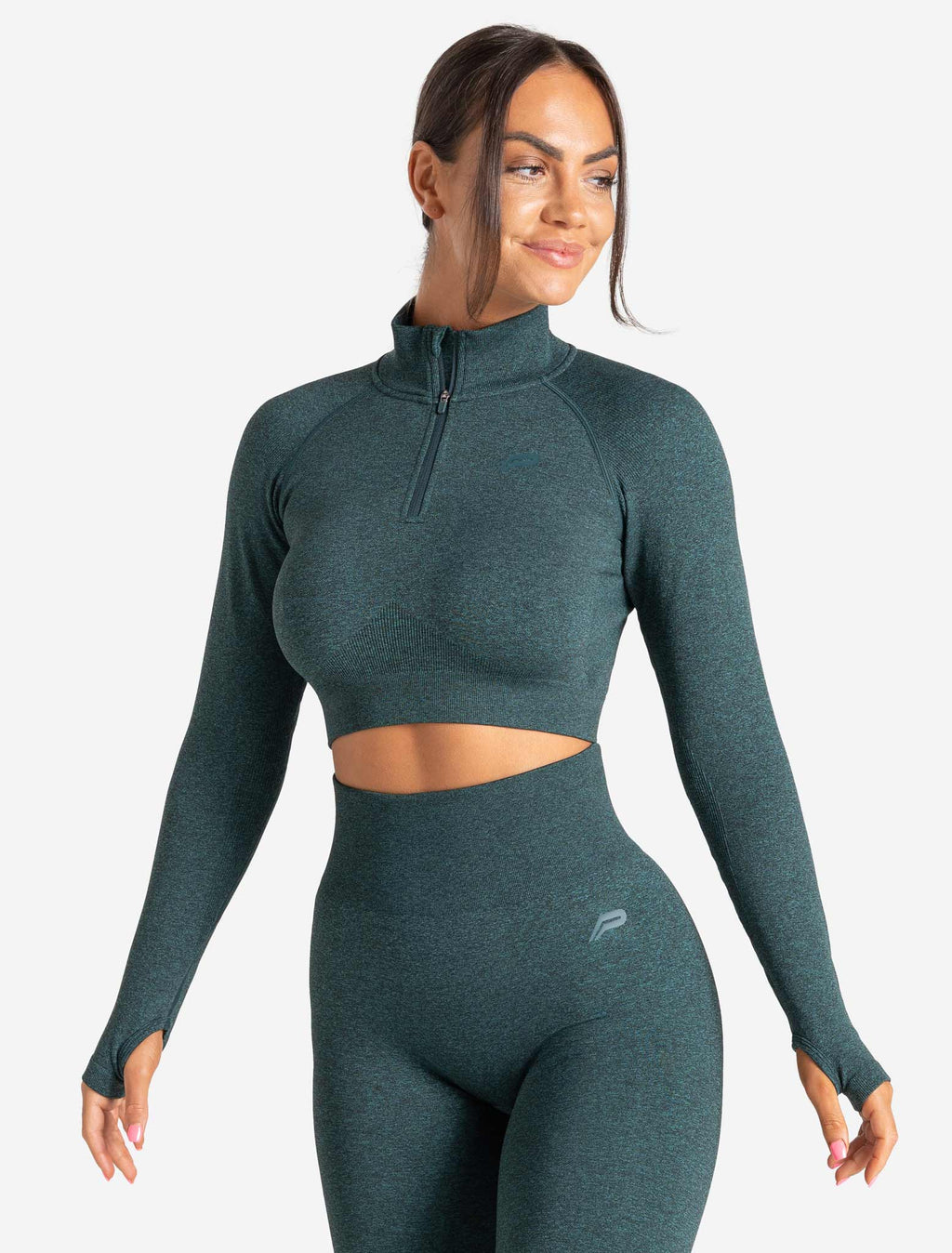 products/womens-core-seamless-crop-12-zip-teal-marl.jpg